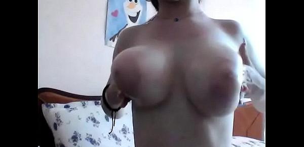  Hot amateur girl teasing her big tits for fun